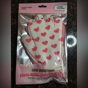 The crème shop LA LA Exfoliating Shower Gloves 2 pairs of gloves. New/sealed